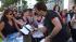 Billy Burke, Charlie Swan, signs books.