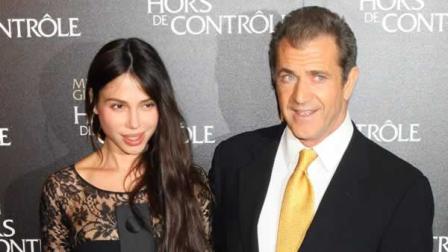 In this Feb. 4, 2010 file photo, Mel Gibson and Oksana Grigorieva arrive at the Edge Of Darkness premiere in Paris.