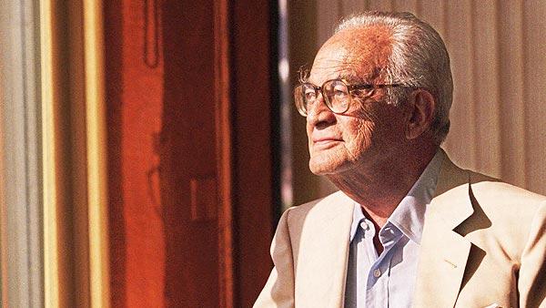 Film producer Dino De Laurentiis poses in his office in Beverly Hills, Calif., Sept. 16, 1998. Laurentiis died on Nov. 10, 2010, at the age of 91.