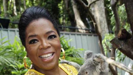 This file photo taken Wednesday, Dec. 8, 2010 and provided by Harpo Productions Inc., shows talk-show host Oprah Winfrey holding an 18-month-old koala named Elvis at the Hamilton Island Wildlife Park in Whitsundays, Australia.