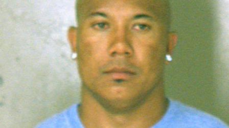 Hines Ward appears in a mugshot from July 9, 2011, provided by DeKalb County Jail.