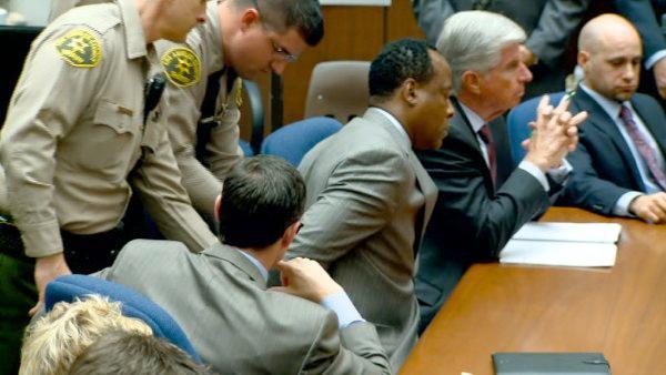 Dr. Conrad Murray is remanded into custody after the jury returns with a guilty verdict in his involuntary manslaughter trial Monday, Nov. 7, 2011.