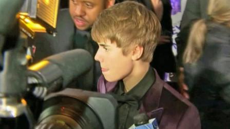 Pop star Justin Bieber is seen surrounded by cameras in this undated file photo.
