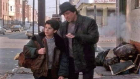 Sylvester Stallone (right) walks with son Sage Stallone (left) in a scene from the 1990 film Rocky V.