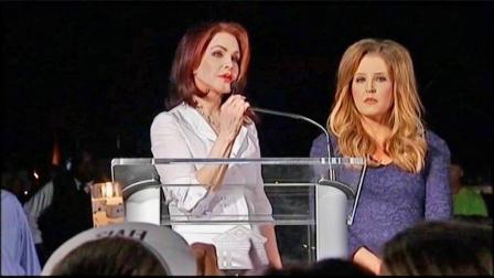 Priscilla Presley, left, and Lisa Marie Presley speak to fans gathered at a candlelight vigil at Graceland, Elvis Presleys Memphis, Tenn. home, on Wednesday, Aug. 15, 2012.