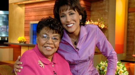 This 2006 photo shows Good Morning America co-host Robin Roberts, right, with her mother Lucimarian Roberts on the set in New York.
