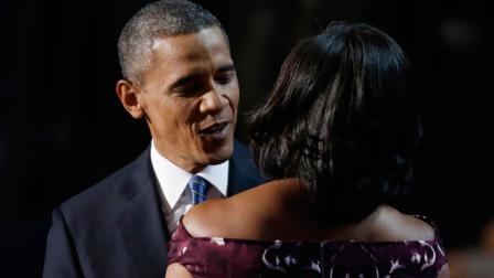 President Barack Obama hugs his wife First lady Michelle Obama at the Democratic National Convention in Charlotte, N.C., on Thursday, Sept. 6, 2012.