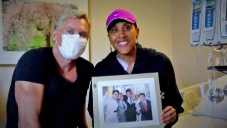 Good Morning America weather anchor Sam Champion and Good Morning America co-anchor Robin Roberts pose in this September 2012 photo.