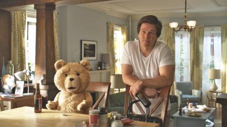 Mark Wahlberg and Ted are shown in a still image from the film, Ted.
