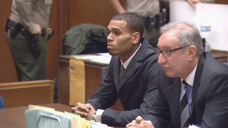 Singer Chris Brown was in court Wednesday, Feb. 6, 2013, to face questions over whether he violated his probation by failing to perform his community labor sentence for Rihannas 2009 beating.