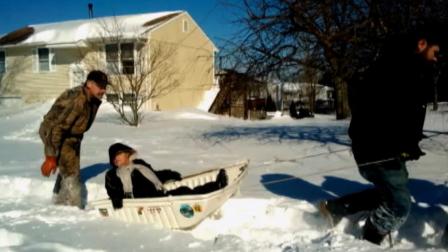 Lauri Wood, 42, of Naugatuck, Conn. was rushed into labor on a sled Sunday, Feb. 17, 2013 after a blizzard buried her car and street under three feet of snow.