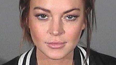 Actress Lindsay Lohan appears in a mug shot from March 19, 2013.