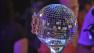 A side view of the Dancing With The Stars mirror ball trophy.