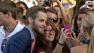 Chris Pine poses for a photo with a fan at the Los Angeles premiere of Star Trek Into Darkness at The Dolby Theatre on Tuesday, May 14, 2013.