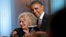 President Barack Obama presents the Library of Congress Gershwin Prize for Popular Song during an East Room concert honoring singer-songwriter Carole King, Wednesday, May 22, 2013, at the White House in Washington.