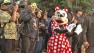 A crowd gathers around Minnie Mouse during Disneylands 24-hour celebration Friday, May 24, 2013.