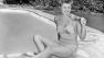 Actress and former national swimming champion Esther Williams is shown poolside at her home in Hollywood, June 10, 1948. Williams died on Thursday, June 6, 2013 in her sleep, according to her longtime publicist Harlan Boll.