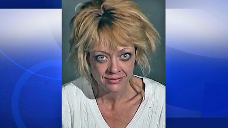 That 70s Show actress Lisa Robin Kelly is seen in this 2012 mug shot after she was arrested on allegations of domestic assault.
