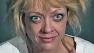 That 70s Show actress Lisa Robin Kelly is seen in this 2012 mug shot after she was arrested on allegations of domestic assault.