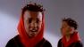 Kris Kross rappers Chris Kelly (left) and Chris Smith (right) appear in a scene from the 1992 music video Jump.