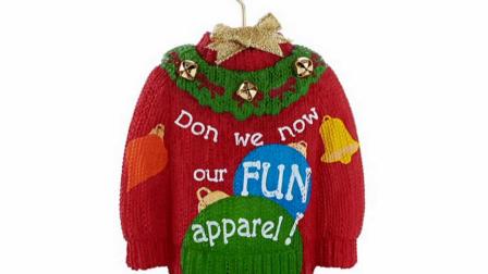 Hallmarks Holiday Sweater keepsake ornament is seen in this photo.