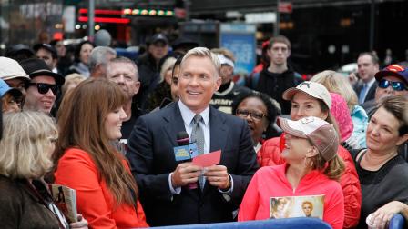 Weather anchor Sam Champion appears on Good Morning America on Nov. 7, 2013.