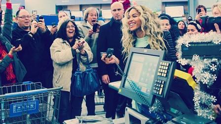 Beyonce is shown in a photo posted on her official Instagram accouint at a Massachusetts Wal-Mart, where she surprised fans on Friday, Dec. 20, 2013.