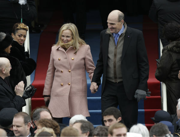 Singer James Taylor arrives and his wife...