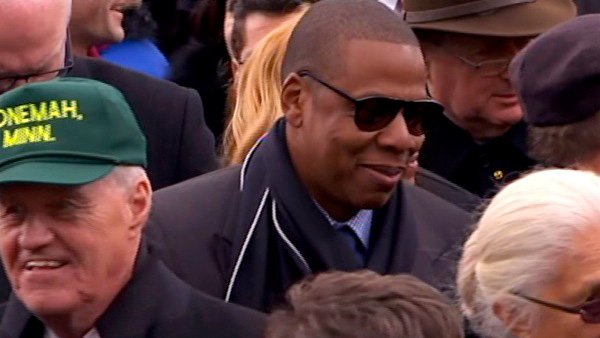 Jay-Z is seen in the crowd after President...