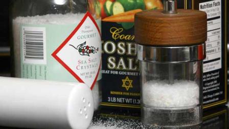 Various types of salt are shown in this file photo. The government released a guideline stating that certain groups of people should lower their salt intake to about half a teaspoon daily.