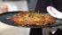 Jason Harley makes his signature pizzas with...