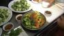 Chilled Brussels sprout slaw with tangerine, toasted almonds and ginger soy vinaigrette are seen in this photo.