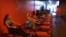 People work out in a fitness class at Orange Theory.