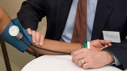 Del. Donna Christensen, D-V.I. left, getting her blood pressure checked by Dr. Jeffrey Perlmutter of the National Kidney Foundation, Thursday, May 17, 2007.