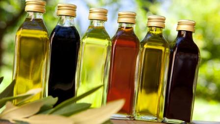 Bottles of oil olive and vinegar are seen in this file photo.