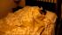A person sleeps on a bed in this undated file photo.