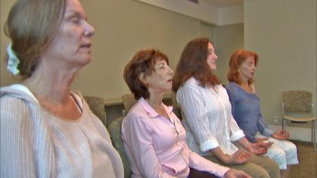 A group of women is seen meditating in this undated file photo.