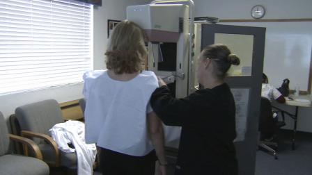A woman gets a breast examination in this undated file photo.
