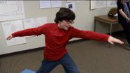 A child demonstrates a yoga move in this undated file photo.