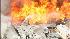 Commercial building in South L.A. is on fire.