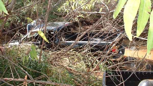 Slideshow: Woman survives floodwaters