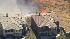 Firefighters battle a fast moving brush fire...