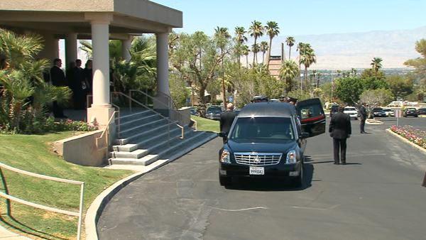 A hearse carrying the casket of former first lady Betty Ford arrives at St. Margaret's Episcopal Church in Palm Desert, Calif., Tuesday, July 12, 2011, for funeral services.