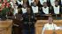 A singer performs at the funeral service of...
