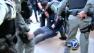 A tent taken down by police Sunday afternoon turned the Occupy Riverside protest into melee, resulting in 11 arrests.