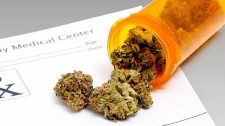 The city of Garden Grove has halted the registration process for medical marijuana dispensaries because of unresolved legal issues in Long Beach and at the federal level.