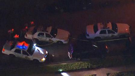 Authorities investigate a double shooting in Highland on Tuesday, March 20, 2012.