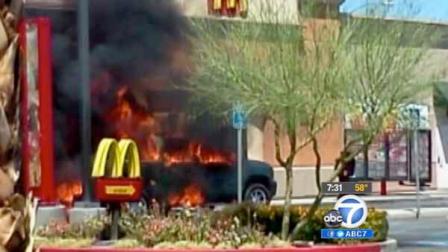 A truck is seen on fire after propane tanks in the truck bed leaked and caused an explosion in Coachella on Saturday, April 21, 2012.
