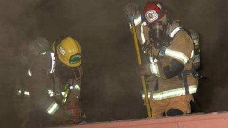 Firefighters battle a blaze at an apartment building in the 1100 block of Cero Court of Redlands on Saturday, May 19, 2012.
