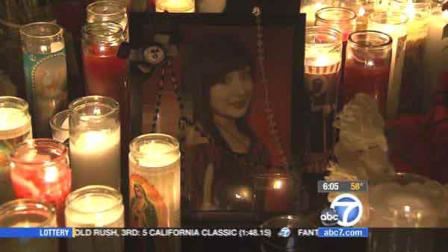 Candles surround a framed photo of Ashley Caldera, who was shot and killed while celebrating her 16th birthday at Northgate Park in Fontana on Saturday, May 26, 2012.